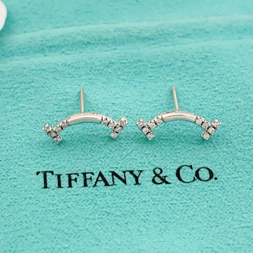 Tiffany & Co. Silver diamond smiley face earrings